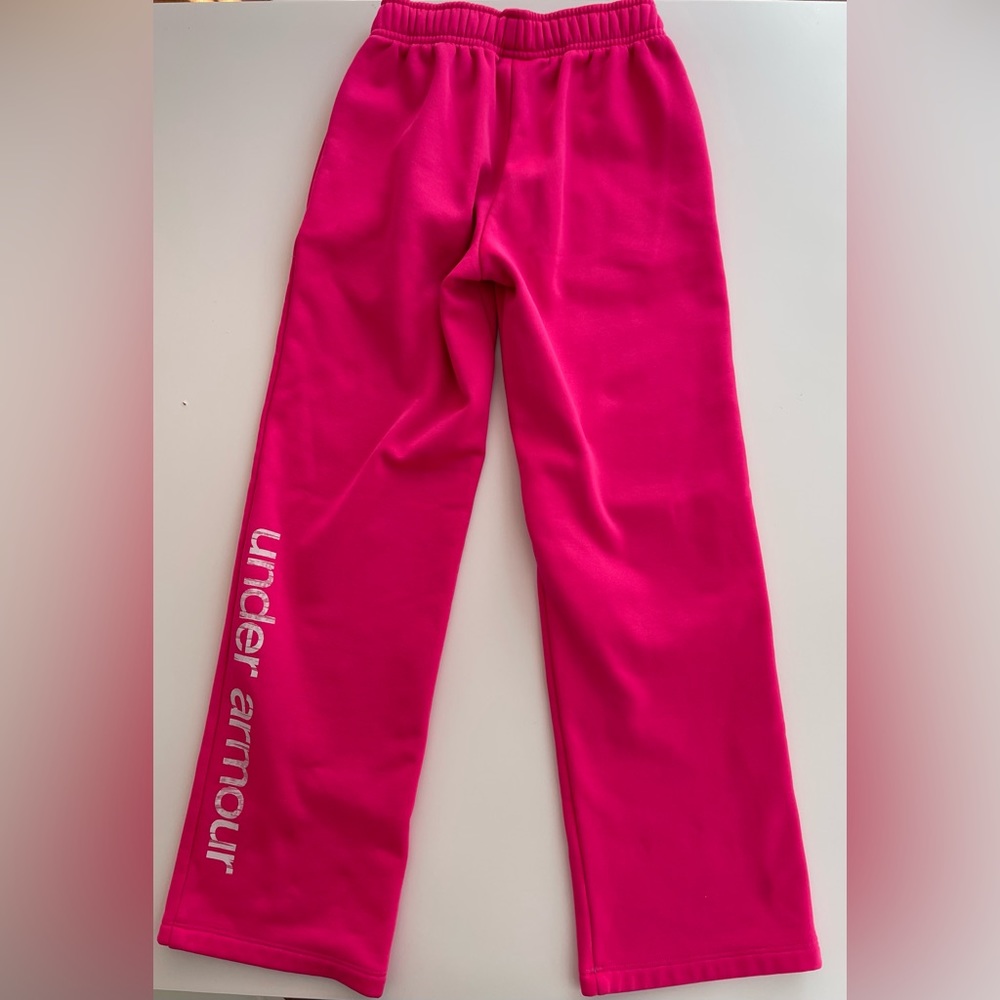 Girls pink Under Armour worn out pants size YSM.